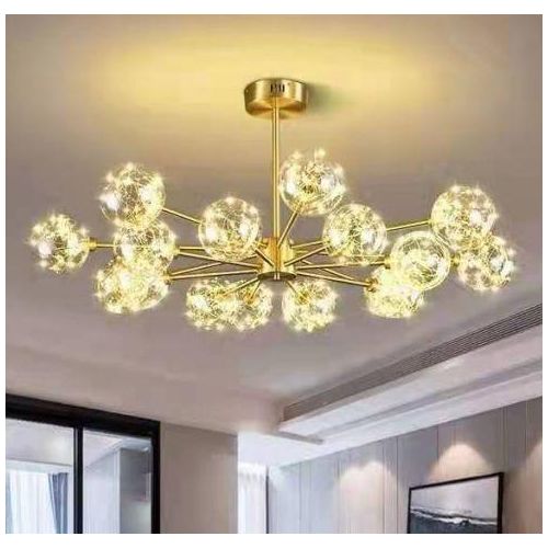 Radial starburst chandelier with a gold finish and clustered glass globes.