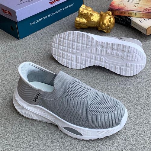 Breathable knitted/mesh fabric Slip-on casual sneakers.