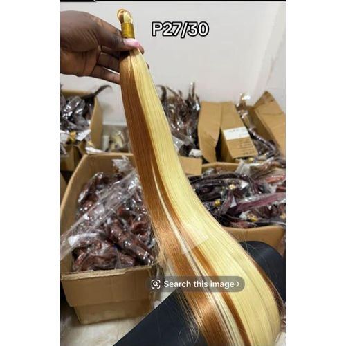 bone straight braiding hair extensions in color shade P27/30 (a mix of blonde and auburn/brown piano-style highlights