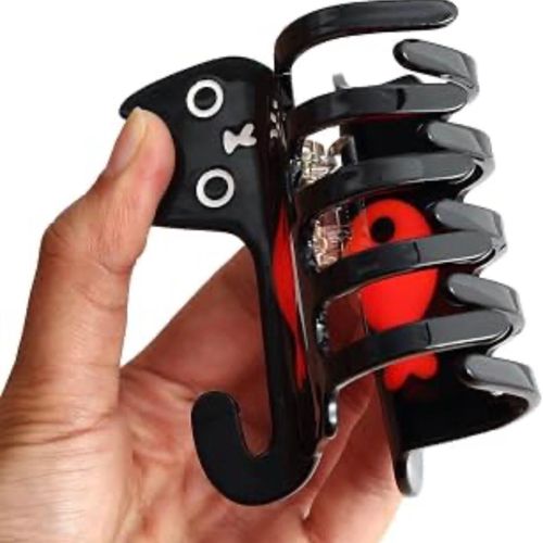 black hair claw clips packaged in a clear plastic bag