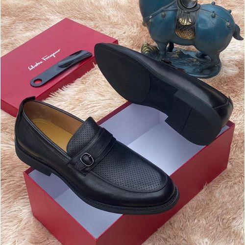 Black leather slip-on loafer.