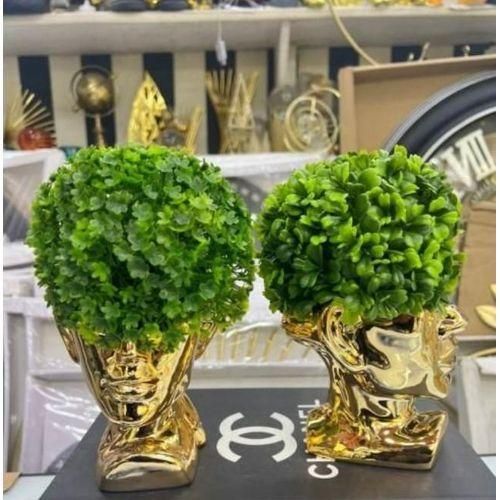 Tabletop Artificial Gold Head Sculpture With Green Flowers As Hair