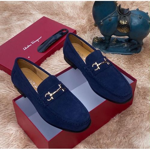Navy blue suede leather slip-on loafer.