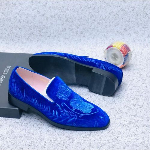 Slip-on loafer design with a sleek, formal silhouette.