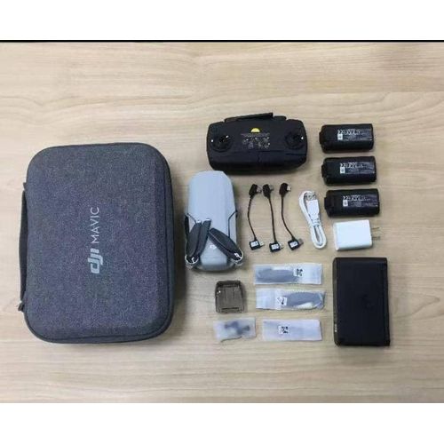 DJI Mini 1 strictly for mini use only + 3 batteries + wings + Memory card + charger cable + battery box + controller + cables ( open box tested - please its mini version, only expert should use please )
