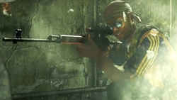 Soldier looking down a rifle with a scope attachment in 'Modern Warfare 2'
