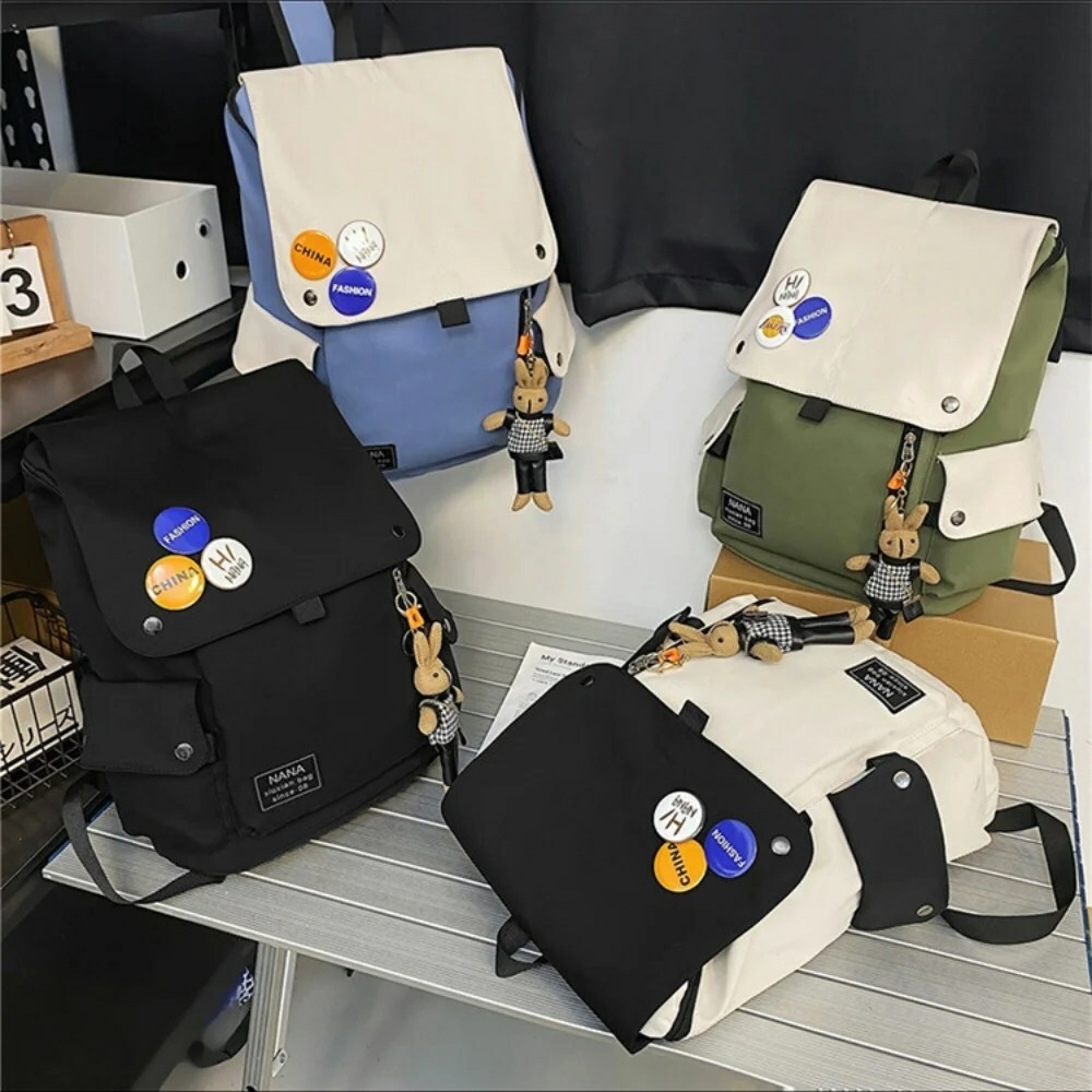 white,black, green and blue cool capacity backpack