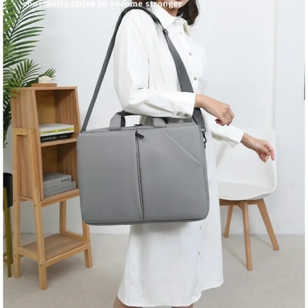 pro midzip laotop bag grey female model display