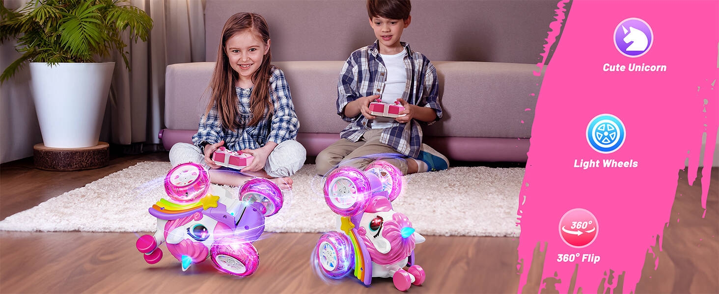 a girl and a boy playing with a toy car.