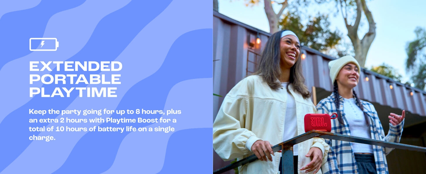 Text reads 'EXTENDED PORTABLE PLAYTIME', 'Keep the party going for up to 8 hours, plus wireless charging with Powerbank Dock for on-the-go charge'. Two people outdoors with red speaker visible.