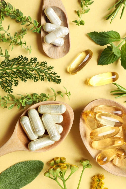 image of wooden spoons holding supliments