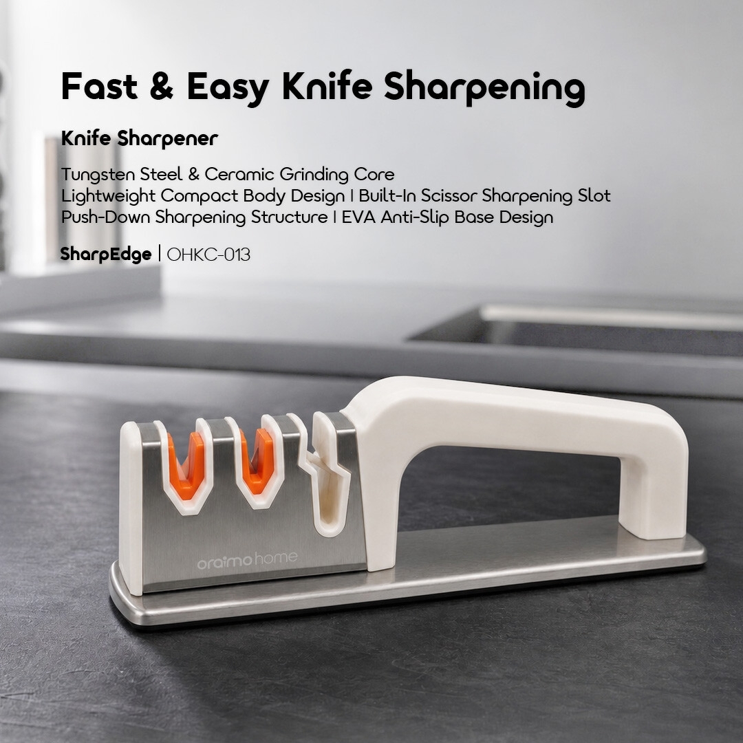 oraimo-sharpedge-knife-sharpener-ohkc-013-01-fast-and-easy-knife-sharpening-tungsten-steel-and-ceramic-grinding-core-lightweight-compact-body-design-built-in-scissor-sharpening-slot-push-down-sharpening-structure-eva-anti-slip-base-design