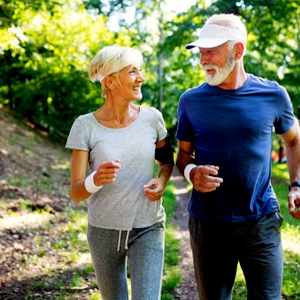 older couple running  purity products ha joint and skin formula