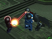 Superman using his heat vision in Lego Batman 2: DC Super Heroes for PS Vita