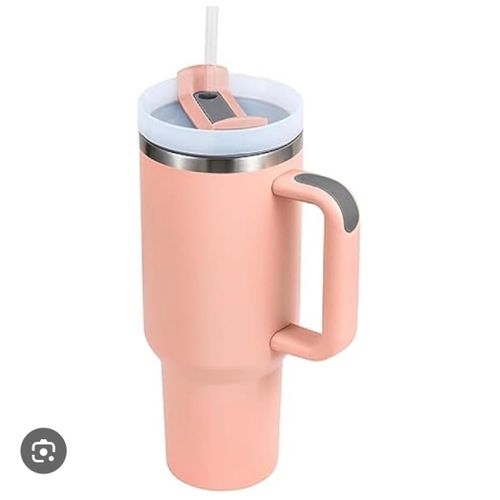 40oz stainless steel insulated tumbler that features a sturdy side handle and a rotating straw lid
