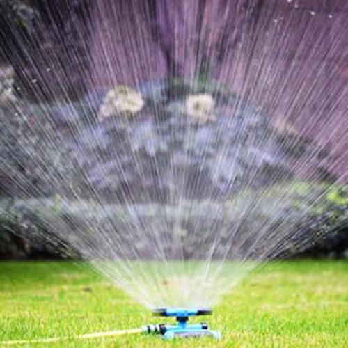 Automatic Garden Sprinklers Watering Grass