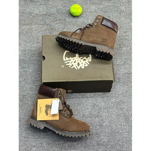 Timbs ankle-high jungle, work/hiking boot.