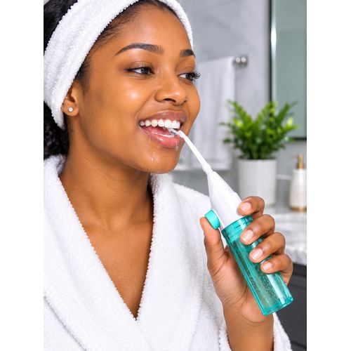Sizeable water flosser. No batteries or charging required.