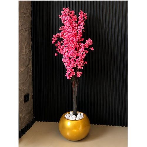 Pink artificial flower with gold pot