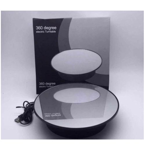 360 Degree Electric Turntable with a mirrored top surface, used for product displays and photography