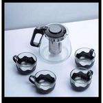 Glass teapot kettle with cups