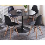 round dining table set with 4 Eames-style molded plastic chairs and wooden legs