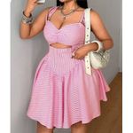 A pink pin stripe flare gown
