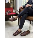Brown slip-on loafer design.