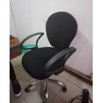 Modern mid-back office chair with a rounded 