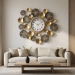 Generic Luxurious gold wall clock  featuring a floral-inspired design with metallic leaves - 70CM