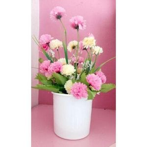 Artificial Flower In A Mini White Plastic Pot
