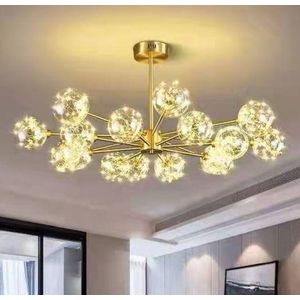 Radial starburst chandelier with a gold finish and clustered glass globes.