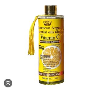 300ml bottle of Moroccan Argan Essential Oils 6-in-1 Vitamin C Whitenin and Glowing Oil