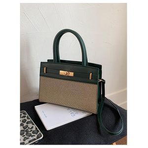 Classsy Green Leather Office Handbag For Women With Unique Canvas Design
