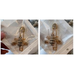 Nappy pin-inspired Brooch