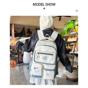 Fashionable Dual-Tone White and Blue Fash*on Backpack for Teenagers, High-Volume School Bag with Multiple Front Pockets, Backpack for Tech and Books, Heavy-Duty Canvas Material, Weatherproof School Gear, Modern Minimalist Aesthetic Backpack