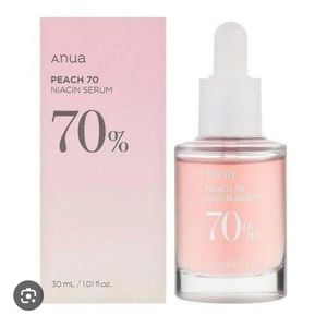 Anua Peach 70 Niacin Serum, a 30 ml (1.01 fl oz) Korean skincare product designed to hydrate and brighten the skin