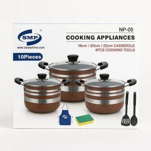 4-piece non-stick cooking appliance set. 