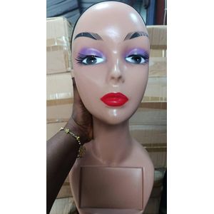 Canvas  mannequin head, commonly used for wig making and display. 