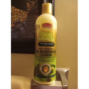 Fashion Choice African Pride Olive Miracle Anti-Breakage Daily Hydration Oil Moisturizer Lotion With Olive & Tea Tree Oils – 355ml