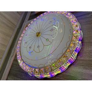 Round Modern LED crystal flush-mount ceiling chandelier light with Bluetooth connectivity.