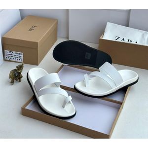 Open-toe slip-on sandal design.