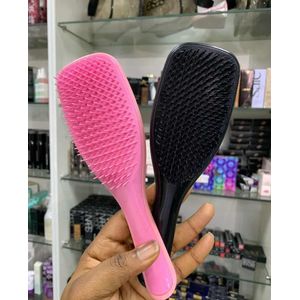 The Ultimate Detangler by Tangle Teezer. 