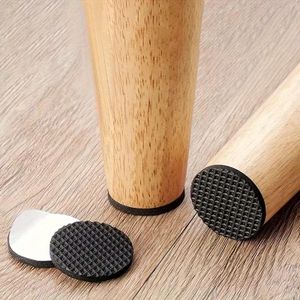 Set of 48 Plastic Chair Leg Protectors Designed to Reduce Noise And Prevent Slipping, Suitable for Dining Chairs And Tables. They Come in a Dark Brown Color And Are Made from Durable Plastic, Providing Furniture Protection with a Modern Look