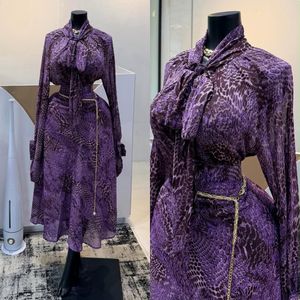 Purple Animal Print Long-Sleeve Skirt Set with Neck Tie & Chain Detail
