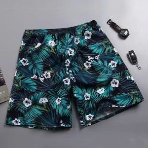 Men's Tropical Floral Shorts – Black & Teal Leaf Print Casual Beach Shorts with White Flowers, Summer Holiday & Vacation Wear