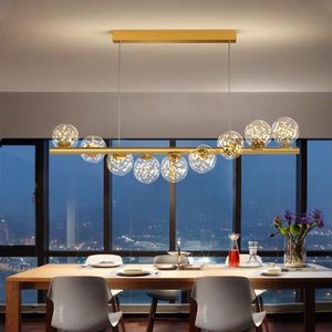 8-light gold linear bubble chandelier light with LED glass globe.