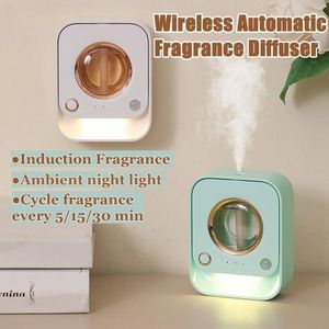 Smart sensor night aromatherapy diffuser with a bottle of humidifier oil 