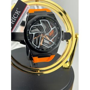 Rubber Spinning Color wristwatch featuring a distinct wheel-inspired dial design and a red rubber strap.