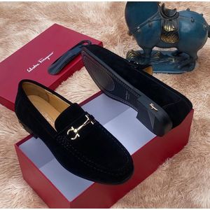 Black suede leather slip-on loafer.